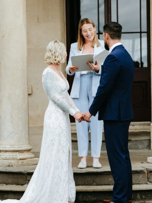 Close up of Olivia reading at modern couple Beth & Alexander's wedding