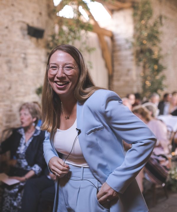 Olivia laughing at UK wedding